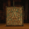 1 RADIANCE OF COMPASSION – 19TH CENTURY GILT COPPER JOWO BUDDHA WALL THANGKA